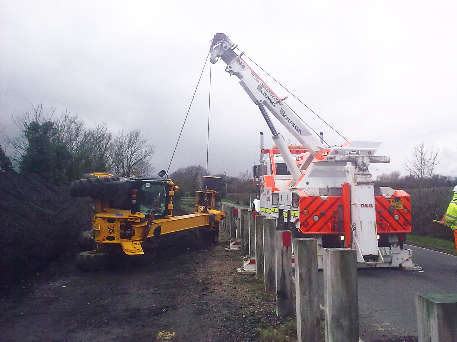 Recovery operator working within a construction site boundary